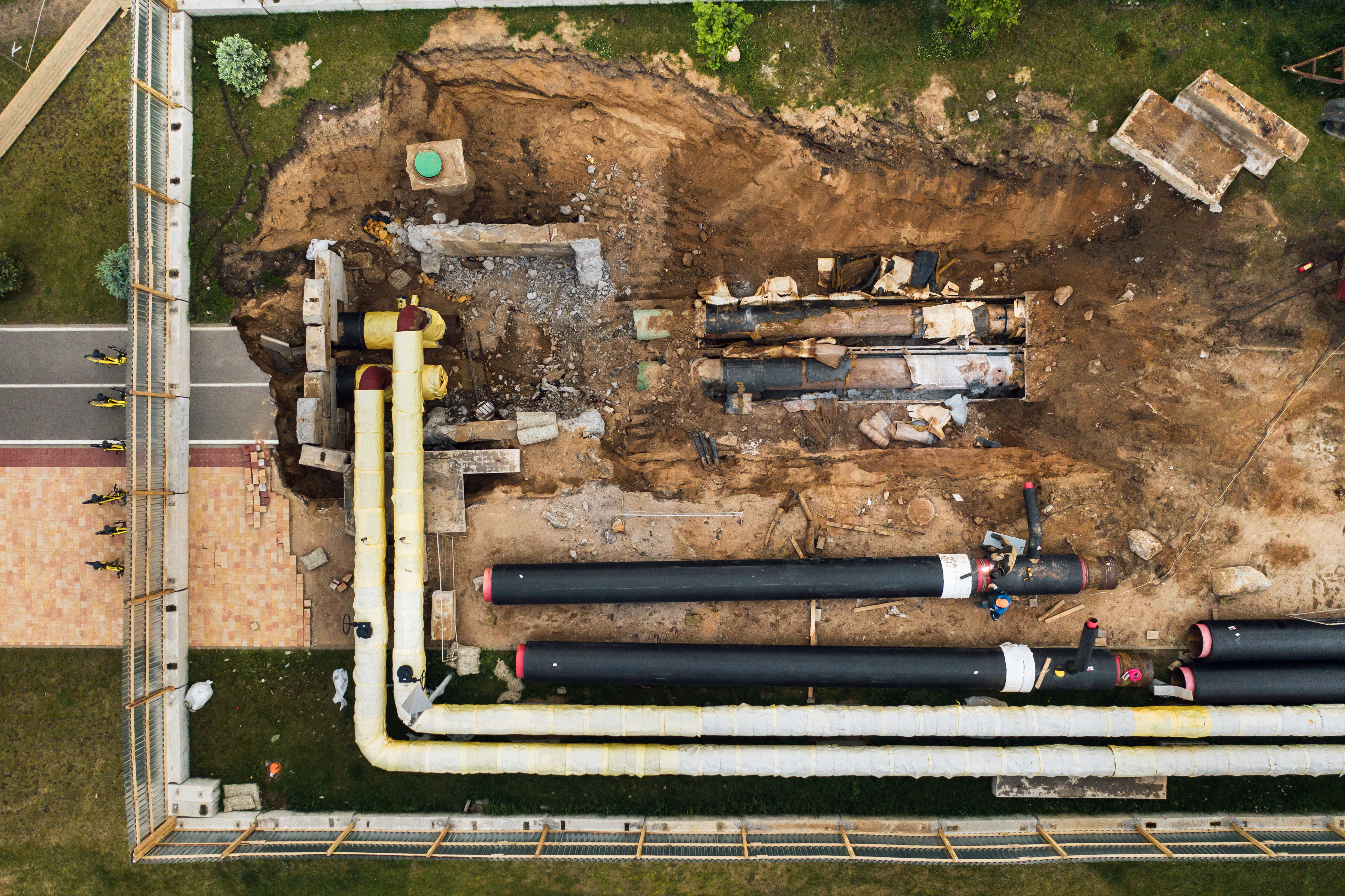 Aerial view of large-scale underground pipeline installation and replacement project